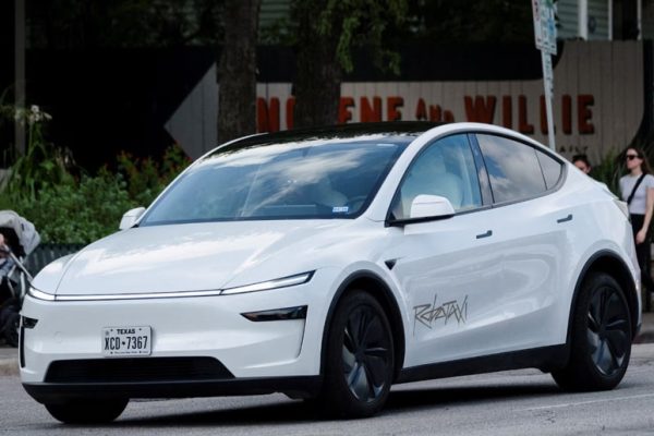 Tesla tests robotaxis with no human inside, shares jump