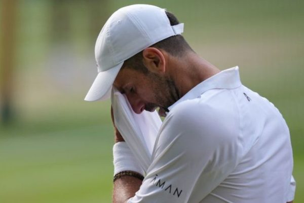 Djokovic vows Wimbledon comeback after semi-final defeat