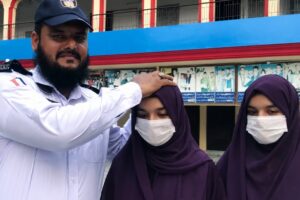 Traffic warden’s twin daughters score same marks in Matric exams